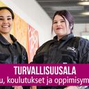 Kaksi vartijaa työkohteen käytävällä